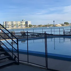 By The Apartment